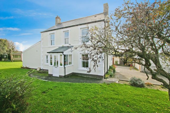 4 bed detached house