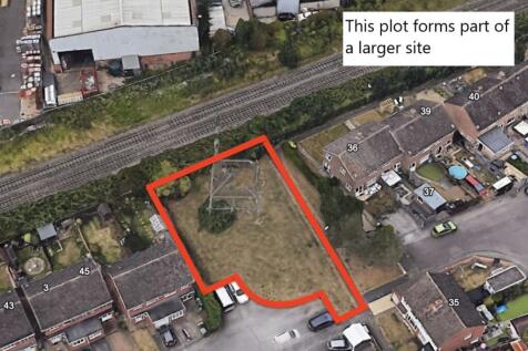 Land and Buildings on the East Side... Land for sale