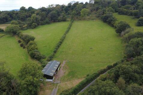 Approximately 10.75 acres of land and... Farm land for sale