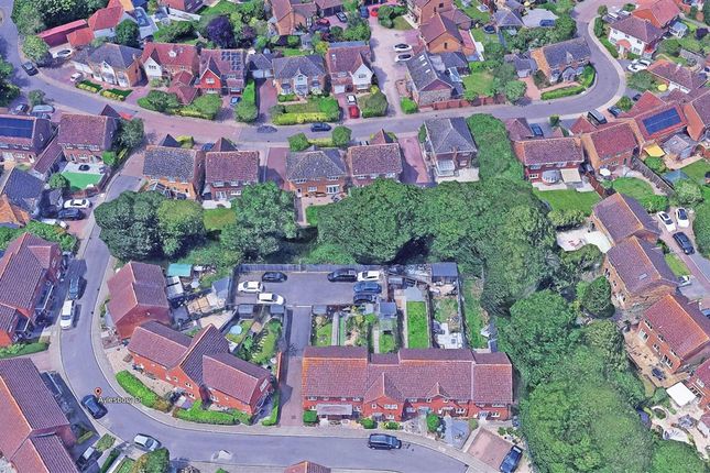 Land, in Aylesbury Drive, £10,000