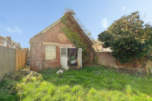 Land, in Cecil Street, £84,500