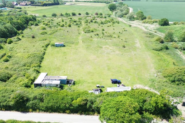 Land, in Malting Lane, £190,000