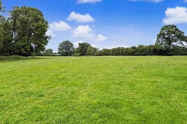 Land, in Woonton, £200,000