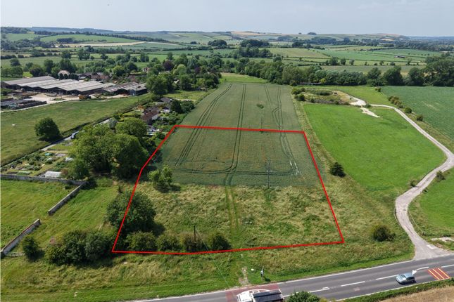 Land, in West Farm, £75,000