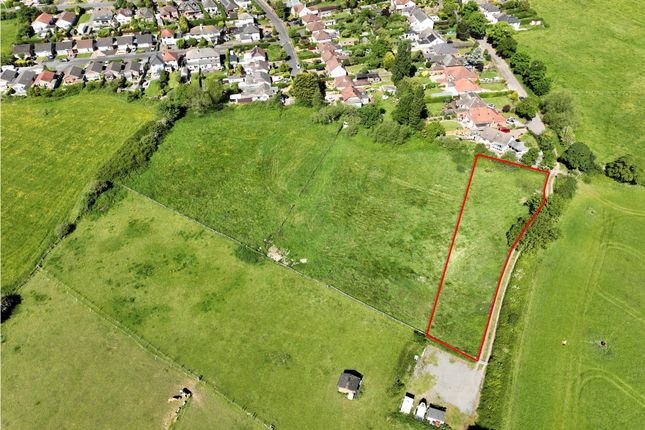 Land, in Woodlands Road, £30,000