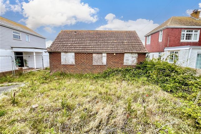 Land, in Merritt Road, £225,000