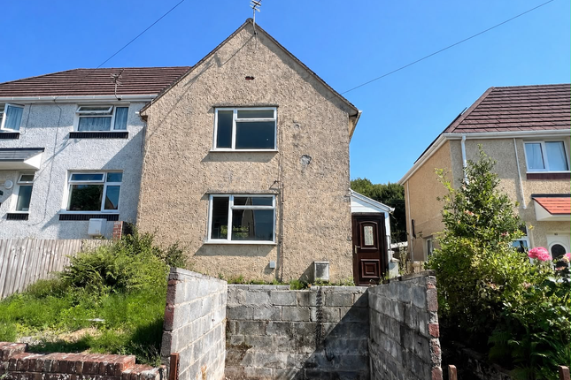 Land, in 51 Derwydd Avenue, £30,000
