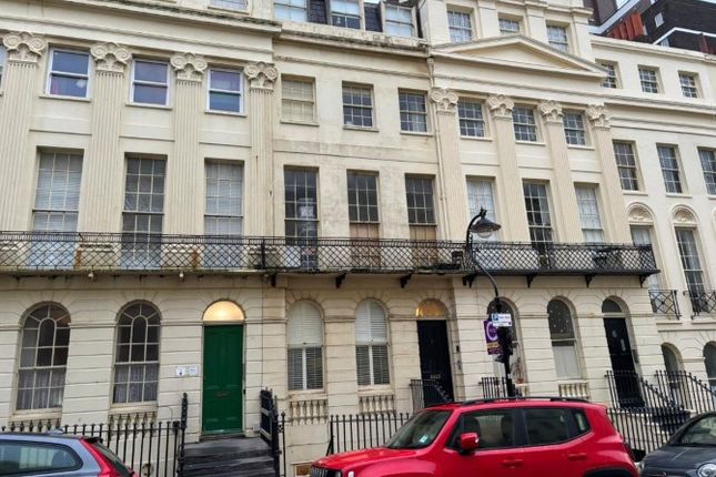 Land, in Flat 4, £70,000