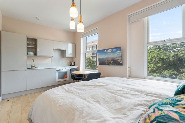 Land, in Holloway Road, £210,000