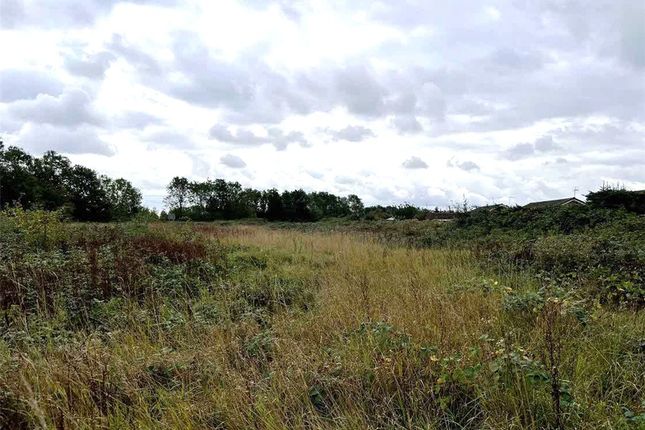 Land, in New Road, £750,000