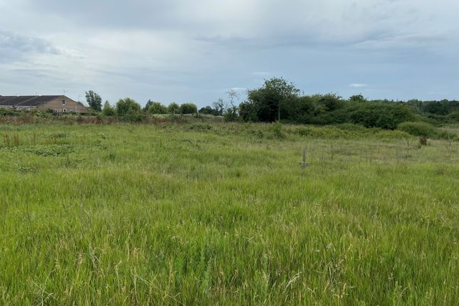 Land, in Upwell Road, £360,000