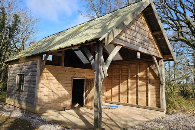 Land, in Oakford, £195,000