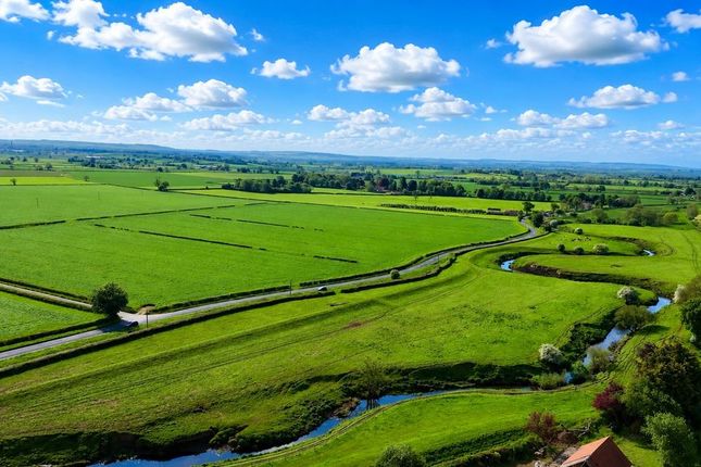 Land, in Normanby, £75,000