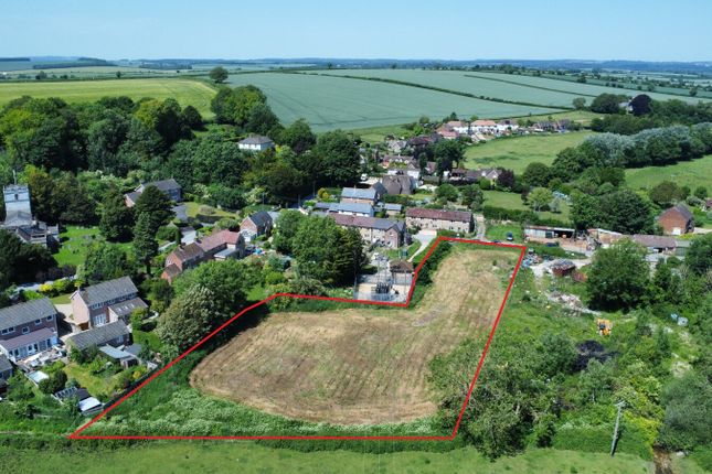 Land, in Gussage St. Michael, £50,000