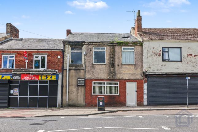 Land, in 62 High Street Willington, £14,000