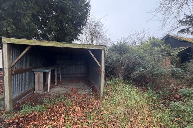 Land, in Garage, £3,000
