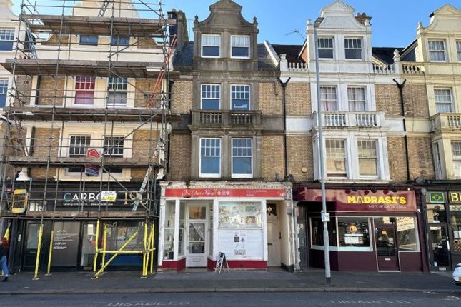 Land, in Flat 6, £85,000