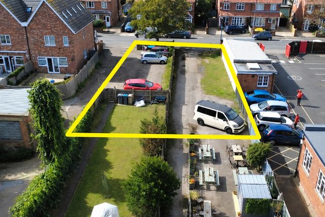 Land, in Hamilton Road, £100,000