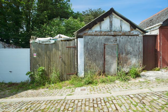 Land, in Hermitage Road, £15,000