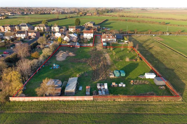Land, in Upwell Road, £700,000