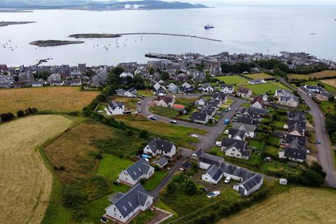 Land, in Plots, £60,000