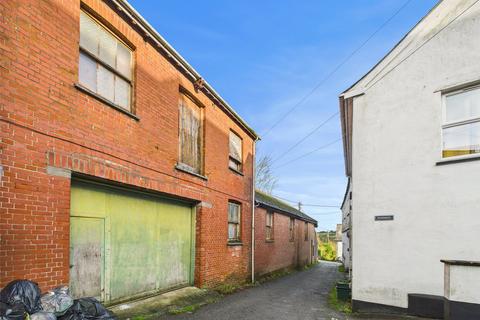 Land, in Church Lane, £180,000