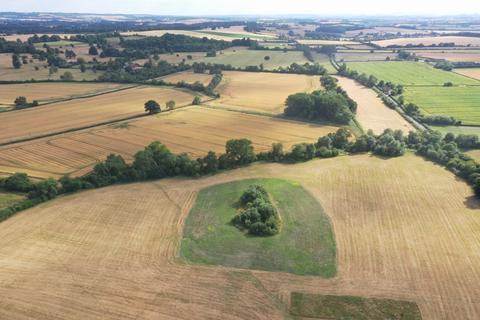 Land, in Stoke Talmage Road, £5,000