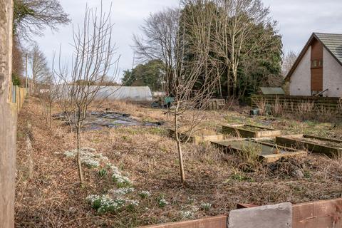 Land, in Bogside Road, £120,000