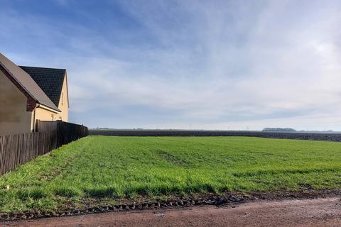 Land, in Whittlesey Road, £135,000