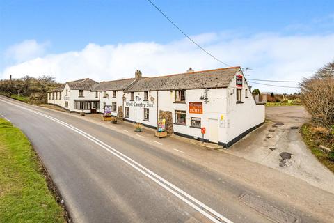 12 bed property, in Hartland, £600,000