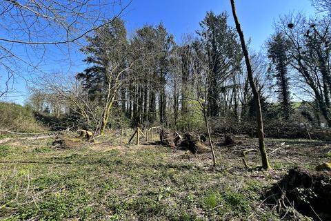 Land, in Ringford, £180,000