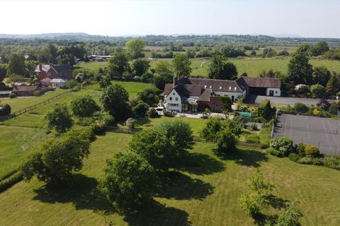 6 bed property, in Tewkesbury Road, £1,575,000