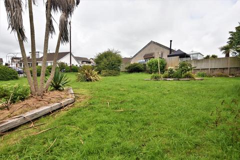 Land, in Pennington Close, £100,000