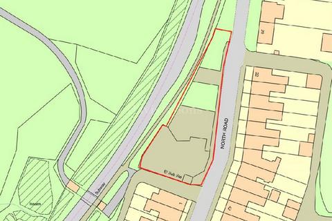 Land, in North Road, £210,000