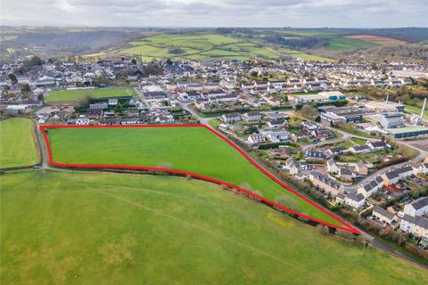 Land, in Land off School Lane, £900,000