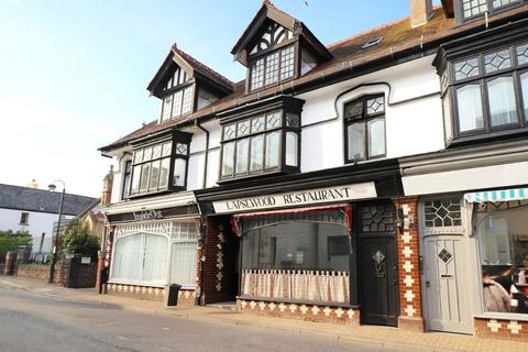 Land, in High Street, £475,000