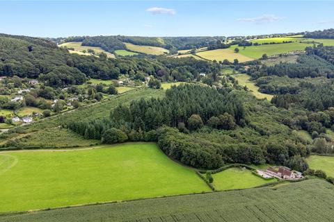 Land, in Lindors Wood, £900,000