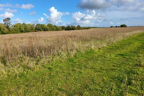 Land, in Northampton Road, £8,000