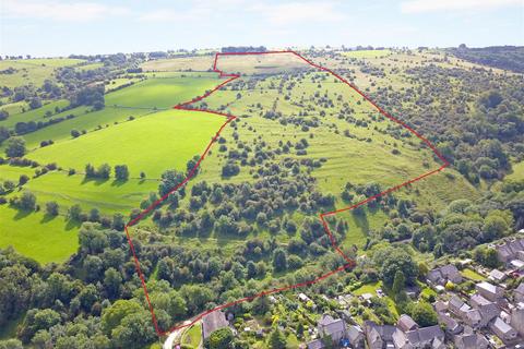 Land, in Grassland and Former Quarry Site, £350,000