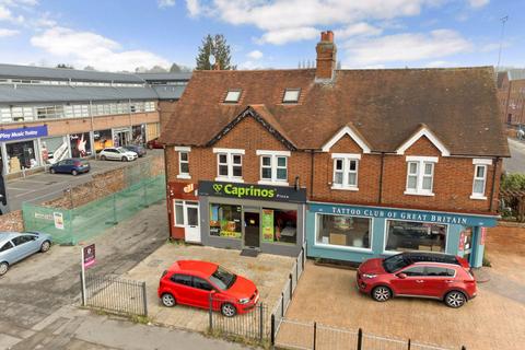 Land, in Cowley Road, £700,000