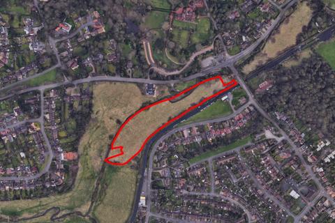 Land, in Windmill Lane, £55,000