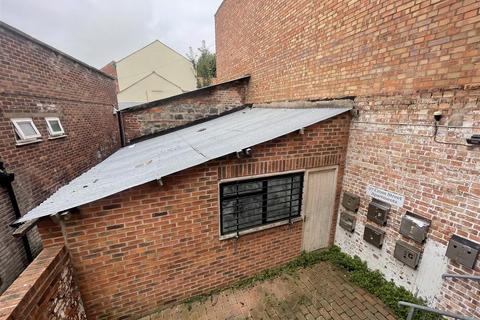 Land, in Building behind 27 Cross Street, £50,000