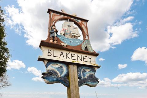 Land, in Blakeney, £850,000