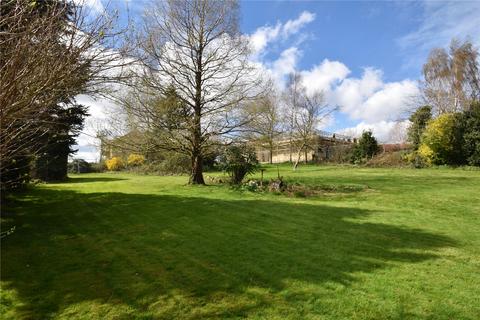 Land, in Iris Close, £500,000