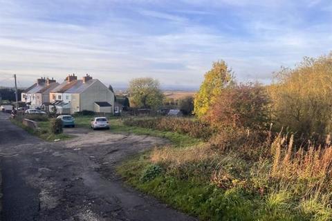 Land, in Renishaw, £75,000