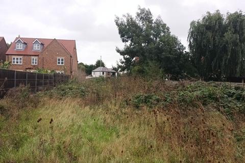 Land, in 76 Thorn Road, £145,000