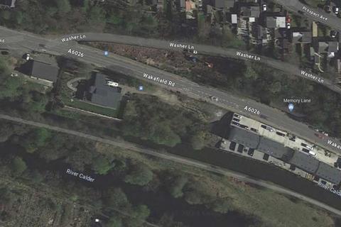 Land, in Wakefield Road, £600,000