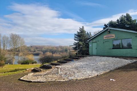 Land, in Astbury Lake, £600,000