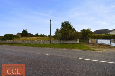 Land, in Lossiemouth Road, £295,000