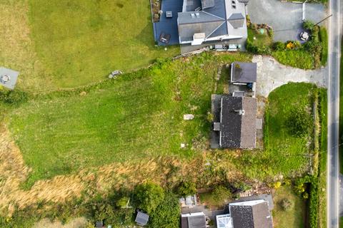Land, in Newborough, £270,000